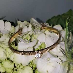 Gold Tone & Crystal Solitaire Dangling Diamong bracelet